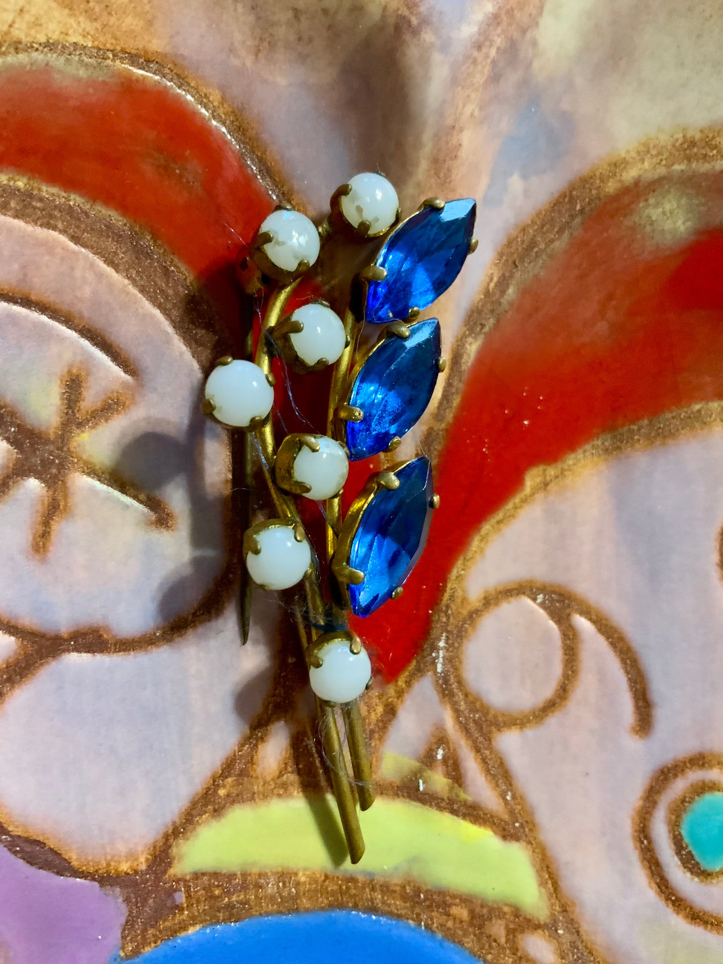 Broche Fleurs et pierres bleues Art deco.