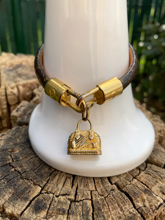 Bracelet Louis Vuitton Alma Cuir Monogrammé Luxe