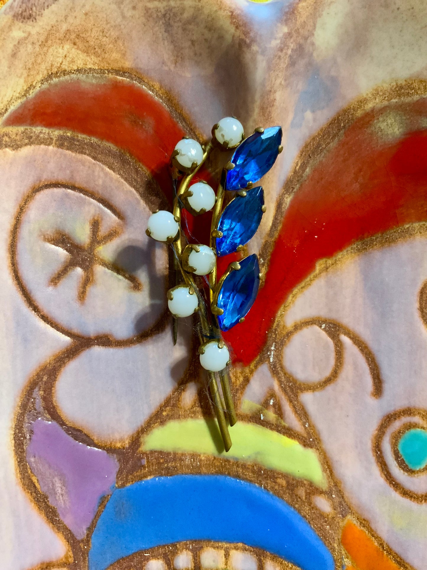 Broche Fleurs et pierres bleues Art deco.